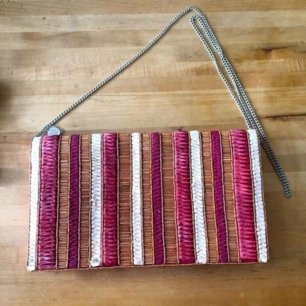 From St Xavier Andromeda fold over clutch-NWOT